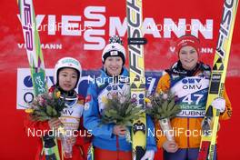 25.01.2014, Planica, Slovenia (SLO): Sara Takanashi (JPN), Daniela Iraschko-Stolz (AUT), Carina Vogt (GER) - FIS world cup ski jumping ladies, individual HS95, Planica (SLO). www.nordicfocus.com. © Mandl/NordicFocus. Every downloaded picture is fee-liable.