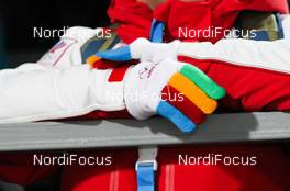 11.02.2014, Sochi, Russia (RUS): Sochi gloves - XXII. Olympic Winter Games Sochi 2014, ski jumping ladies, individual HS106, Sochi (RUS). www.nordicfocus.com. © NordicFocus. Every downloaded picture is fee-liable.