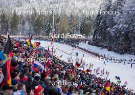 18.01.2015, Ruhpolding, Germany (GER): Darya Domracheva (BLR), Valj Semerenko (UKR), Veronika Vitkova (CZE), Franziska Hildebrand (GER) lead the field along the grand stand - IBU world cup biathlon, mass women, Ruhpolding (GER). www.nordicfocus.com. © Manzoni/NordicFocus. Every downloaded picture is fee-liable.