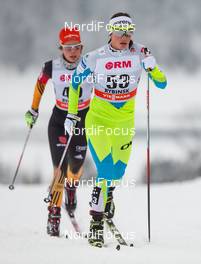 25.01.2015, Rybinsk, Russia (RUS): Katja Visnar (SLO), Fischer, Swix, One Way followed by Hanna Kolb (GER), Madshus, Swix, Adidas - FIS world cup cross-country, skiathlon women, Rybinsk (RUS). www.nordicfocus.com. © Laiho/NordicFocus. Every downloaded picture is fee-liable.