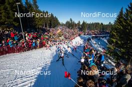 14.03.2015, Oslo, Norway (NOR): a group of skiers in an upphil with lots of spectators - FIS world cup cross-country, mass men, Oslo (NOR). www.nordicfocus.com. © Laiho/NordicFocus. Every downloaded picture is fee-liable.
