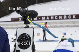 16.03.2016, Khanty-Mansiysk, Russia (RUS): Event Feature: Uktrainian national colours on the galss at the shooting range -  IBU world cup biathlon, training, Khanty-Mansiysk (RUS). www.nordicfocus.com. © Manzoni/NordicFocus. Every downloaded picture is fee-liable.