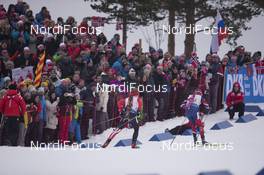 12.03.2016, Oslo, Norway (NOR): Scott Gow (CAN), Johannes Thingnes Boe (NOR), (l-r) - IBU world championships biathlon, relay men, Oslo (NOR). www.nordicfocus.com. © NordicFocus. Every downloaded picture is fee-liable.