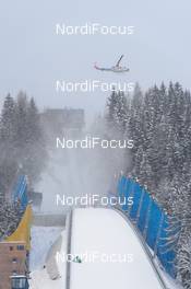 17.01.2016, Tauplitz/Bad Mitterndorf, Austria (AUT): helicopter cleaning the trees from snow  - FIS ski flying world championships, team HS225, Tauplitz/Bad Mitterndorf (AUT). www.nordicfocus.com. © Rauschendorfer/NordicFocus. Every downloaded picture is fee-liable.