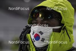 03.03.2017, Pyeong Chang, Korea (KOR): Event Feature: A volunteer observs the photographers -  IBU world cup biathlon, sprint men, Pyeong Chang (KOR). www.nordicfocus.com. © Manzoni/NordicFocus. Every downloaded picture is fee-liable.