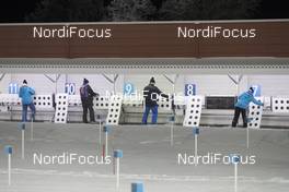 01.12.2017, Oestersund, Sweden, (SWE): Biathlon Feature: Range staff changes targets - IBU world cup biathlon, sprint women, Oestersund (SWE). www.nordicfocus.com. © Manzoni/NordicFocus. Every downloaded picture is fee-liable.