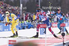 14.01.2018, Ruhpolding, Germany (GER): Fredrik Lindstroem (SWE), Tarjei Boe (NOR), (l-r) -  IBU world cup biathlon, mass men, Ruhpolding (GER). www.nordicfocus.com. © Manzoni/NordicFocus. Every downloaded picture is fee-liable.