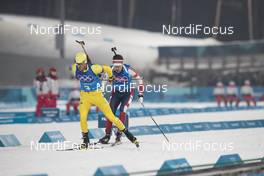 23.02.2018, Pyeongchang, Korea (KOR): Fredrik Lindstroem (SWE), Emil Hegle Svendsen (NOR), (l-r) - XXIII. Olympic Winter Games Pyeongchang 2018, biathlon, relay men, Pyeongchang (KOR). www.nordicfocus.com. © Manzoni/NordicFocus. Every downloaded picture is fee-liable.