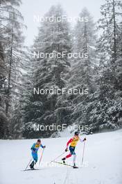 29.12.2021, Lenzerheide, Switzerland (SUI): Hugo Lapalus (FRA), Johannes Hoesflot Klaebo (NOR), (l-r)  - FIS world cup cross-country, tour de ski, 15km men, Lenzerheide (SUI). www.nordicfocus.com. © Modica/NordicFocus. Every downloaded picture is fee-liable.