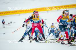31.12.2021, Oberstdorf, Germany (GER): Teresa Stadlober (AUT), Helene Marie Fossesholm (NOR), (l-r)  - FIS world cup cross-country, tour de ski, mass women, Oberstdorf (GER). www.nordicfocus.com. © Modica/NordicFocus. Every downloaded picture is fee-liable.