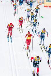 03.01.2022, Val di Fiemme, Italy (ITA): Tatiana Sorina (RUS), Anne Kjersti Kalvaa (NOR), Teresa Stadlober (AUT), Charlotte Kalla (SWE), Anne Kylloenen (FIN), Johanna Matintalo (FIN), Natalia Nepryaeva (RUS), Kerttu Niskanen (FIN), Tiril Udnes Weng (NOR), (l-r)  - FIS world cup cross-country, tour de ski, mass women, Val di Fiemme (ITA). www.nordicfocus.com. © Modica/NordicFocus. Every downloaded picture is fee-liable.