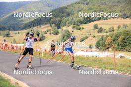 26.08.2023, Brezno-Osrblie, Slovakia (SVK): Martin Cienik (SVK), David Folea (ROU), (l-r) - IBU Summer Biathlon World Championships, sprint junior men, Brezno-Osrblie (SVK). www.nordicfocus.com. © Manzoni/NordicFocus. Every downloaded picture is fee-liable.