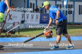26.08.2023, Brezno-Osrblie, Slovakia (SVK): Event Feature: IBU workers cleaning the track - IBU Summer Biathlon World Championships, sprint junior women, Brezno-Osrblie (SVK). www.nordicfocus.com. © Manzoni/NordicFocus. Every downloaded picture is fee-liable.