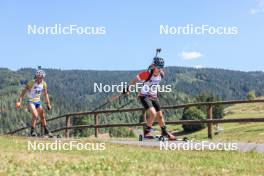 24.08.2023, Brezno-Osrblie, Slovakia (SVK): Horia Urs (ROU), Tom Smith (GBR), (l-r) - IBU Summer Biathlon World Championships, super sprint junior men, Brezno-Osrblie (SVK). www.nordicfocus.com. © Manzoni/NordicFocus. Every downloaded picture is fee-liable.
