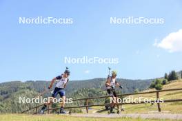 24.08.2023, Brezno-Osrblie, Slovakia (SVK): Vitalii Mandzyn (UKR), Enkhsaikhan Enkhbat (MGL), (l-r) - IBU Summer Biathlon World Championships, super sprint junior men, Brezno-Osrblie (SVK). www.nordicfocus.com. © Manzoni/NordicFocus. Every downloaded picture is fee-liable.