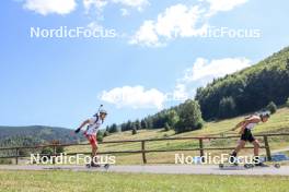 24.08.2023, Brezno-Osrblie, Slovakia (SVK): Martin Hollo (HUN), Abdulkerim Hodzic (SRB), (l-r) - IBU Summer Biathlon World Championships, super sprint junior men, Brezno-Osrblie (SVK). www.nordicfocus.com. © Manzoni/NordicFocus. Every downloaded picture is fee-liable.