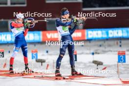 25.11.2023, Oestersund, Sweden, (SWE): Mikulas Karlik (CZE), Tommaso Giacomel (ITA), (l-r) - IBU World Cup Biathlon, mixed relay, Oestersund (SWE). www.nordicfocus.com. © Manzoni/NordicFocus. Every downloaded picture is fee-liable.