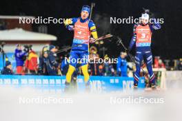 30.11.2023, Oestersund, Sweden, (SWE): Oskar Brandt (SWE), Eric Perrot (FRA), (l-r) - IBU World Cup Biathlon, relay men, Oestersund (SWE). www.nordicfocus.com. © Manzoni/NordicFocus. Every downloaded picture is fee-liable.