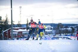 25.11.2023, Oestersund, Sweden, (SWE): Sturla Holm Laegreid (NOR), Sebastian Samuelsson (SWE), (l-r) - IBU World Cup Biathlon, single mixed relay, Oestersund (SWE). www.nordicfocus.com. © Authamayou/NordicFocus. Every downloaded picture is fee-liable.