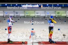 02.12.2023, Oestersund, Sweden, (SWE): Dujin Choi (KOR), Thierry Langer (BEL), (l-r) - IBU World Cup Biathlon, sprint men, Oestersund (SWE). www.nordicfocus.com. © Manzoni/NordicFocus. Every downloaded picture is fee-liable.