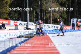17.12.2023, Lenzerheide, Switzerland (SUI): Ingrid Landmark Tandrevold (NOR), Franziska Preuss (GER), (l-r) - IBU World Cup Biathlon, mass women, Lenzerheide (SUI). www.nordicfocus.com. © Manzoni/NordicFocus. Every downloaded picture is fee-liable.