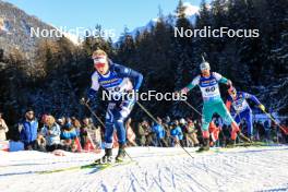 16.12.2023, Lenzerheide, Switzerland (SUI): Jonni Mukkala (FIN), Anton Sinapov (BUL), (l-r) - IBU World Cup Biathlon, pursuit men, Lenzerheide (SUI). www.nordicfocus.com. © Manzoni/NordicFocus. Every downloaded picture is fee-liable.