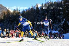 16.12.2023, Lenzerheide, Switzerland (SUI): Martin Ponsiluoma (SWE), Quentin Fillon Maillet (FRA), (l-r) - IBU World Cup Biathlon, pursuit men, Lenzerheide (SUI). www.nordicfocus.com. © Manzoni/NordicFocus. Every downloaded picture is fee-liable.