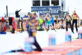 13.12.2023, Lenzerheide, Switzerland (SUI): Undefined athlete competes in front the the welcome to Lenzerheide banner - IBU World Cup Biathlon, training, Lenzerheide (SUI). www.nordicfocus.com. © Manzoni/NordicFocus. Every downloaded picture is fee-liable.