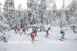 26.11.2023, Ruka, Finland (FIN): Lotta Udnes Weng (NOR), Anne Kjersti Kalvaa (NOR), Delphine Claudel (FRA), Heidi Weng (NOR), Victoria Carl (GER), Astrid Oeyre Slind (NOR), Frida Karlsson (SWE), (l-r)  - FIS world cup cross-country, mass, Ruka (FIN). www.nordicfocus.com. © Modica/NordicFocus. Every downloaded picture is fee-liable.