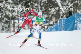 03.12.2023, Gaellivare, Sweden (SWE): Simen Hegstad Krueger (NOR), Leo Johansson (SWE), (l-r)  - FIS world cup cross-country, relay, Gaellivare (SWE). www.nordicfocus.com. © Modica/NordicFocus. Every downloaded picture is fee-liable.