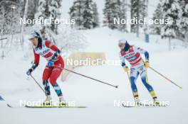 03.12.2023, Gaellivare, Sweden (SWE): Heidi Weng (NOR), Moa Lundgren (SWE), (l-r)  - FIS world cup cross-country, relay, Gaellivare (SWE). www.nordicfocus.com. © Modica/NordicFocus. Every downloaded picture is fee-liable.