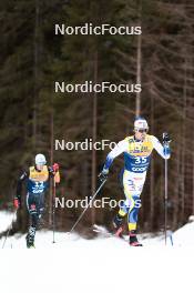 31.12.2023, Toblach, Italy (ITA): Florian Notz (GER), Calle Halfvarsson (SWE), (l-r) - FIS world cup cross-country, tour de ski, 10km, Toblach (ITA). www.nordicfocus.com. © Modica/NordicFocus. Every downloaded picture is fee-liable.