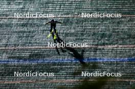 25.08.2023, Oberwiesenthal, Germany (GER): An athlete jumps on the nightly Fichtelberg skijump  - FIS Nordic Combined Summer Grand Prix men and women, training HS105 men, Oberwiesenthal (GER). www.nordicfocus.com. © Volk/NordicFocus. Every downloaded picture is fee-liable.