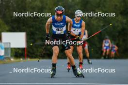 02.09.2023, Villach, Austria (AUT): Tristan Sommerfeldt (GER), Vid Vrhovnik (SLO), (l-r)  - FIS Nordic Combined Summer Grand Prix men and women, compact sprint HS98/7.5km men, Villach (AUT). www.nordicfocus.com. © Volk/NordicFocus. Every downloaded picture is fee-liable.