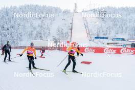26.11.2023, Ruka, Finland (FIN): David Mach (GER), Johannes Rydzek (GER) - FIS world cup nordic combined men, mass HS142/10km, Ruka (FIN). www.nordicfocus.com. © Thibaut/NordicFocus. Every downloaded picture is fee-liable.