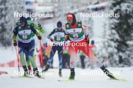 26.11.2023, Ruka, Finland (FIN): Vitaliy Hrebeniuk (UKR), Pascal Mueller (SUI), (l-r)  - FIS world cup nordic combined men, mass HS142/10km, Ruka (FIN). www.nordicfocus.com. © Thibaut/NordicFocus. Every downloaded picture is fee-liable.