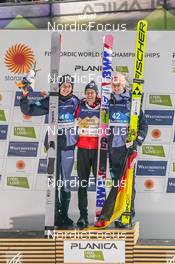 25.02.2023, Planica, Slovenia (SLO): Andreas Wellinger (GER), Piotr Zyla (POL), Karl Geiger (GER), (l-r), (l-r) - FIS nordic world ski championships ski jumping men, individual HS100, Planica (SLO). www.nordicfocus.com. © Thibaut/NordicFocus. Every downloaded picture is fee-liable.