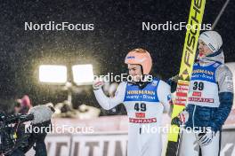 25.11.2023, Ruka, Finland (FIN): Stefan Kraft (AUT), Michael Hayboeck (AUT), (l-r)  - FIS world cup ski jumping men, individual HS142, Ruka (FIN). www.nordicfocus.com. © Thibaut/NordicFocus. Every downloaded picture is fee-liable.