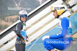 31.12.2023, Garmisch, Germany (GER): Simon Ammann (SUI), Kilian Peier (SUI) - FIS world cup ski jumping men, four hills tournament, individual HS142, Garmisch (GER). www.nordicfocus.com. © Reichert/NordicFocus. Every downloaded picture is fee-liable.