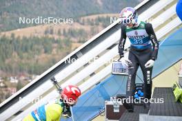 31.12.2023, Garmisch, Germany (GER): Kamil Stoch (POL), Simon Ammann (SUI), (l-r) - FIS world cup ski jumping men, four hills tournament, individual HS142, Garmisch (GER). www.nordicfocus.com. © Reichert/NordicFocus. Every downloaded picture is fee-liable.