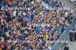 31.12.2023, Garmisch, Germany (GER): feature: fans, stands, crowd, flags, cheering - FIS world cup ski jumping men, four hills tournament, individual HS142, Garmisch (GER). www.nordicfocus.com. © Reichert/NordicFocus. Every downloaded picture is fee-liable.