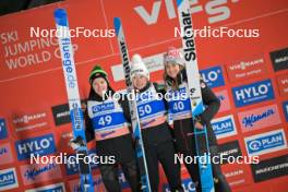 30.12.2023, Garmisch, Germany (GER): Eirin Maria Kvandal (NOR), Nika Prevc (SLO), Abigail Strate (CAN), (l-r) - FIS world cup ski jumping women, individual HS142, Garmisch (GER). www.nordicfocus.com. © Reichert/NordicFocus. Every downloaded picture is fee-liable