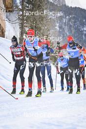 21.01.2023, Zuoz Switzerland (SUI): Kasper Stadaas (NOR), Oskar Kardin (SWE), Karstein Johaug (NOR), (l-r) - Ski Classics La Diagonela, Zuoz (SUI). www.nordicfocus.com. © Reichert/NordicFocus. Every downloaded picture is fee-liable.