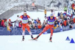 11.01.2024, Ruhpolding, Germany (GER): Christian Gow (CAN), Simon Eder (AUT), (l-r) - IBU World Cup Biathlon, relay men, Ruhpolding (GER). www.nordicfocus.com. © Manzoni/NordicFocus. Every downloaded picture is fee-liable.