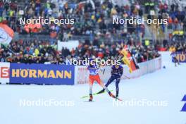 11.01.2024, Ruhpolding, Germany (GER): Jeremy Finello (SUI), Quentin Fillon Maillet (FRA), (l-r) - IBU World Cup Biathlon, relay men, Ruhpolding (GER). www.nordicfocus.com. © Manzoni/NordicFocus. Every downloaded picture is fee-liable.