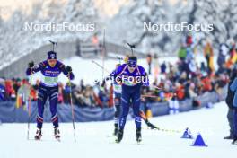 11.01.2024, Ruhpolding, Germany (GER): Emilien Jacquelin (FRA), Sean Doherty (USA), (l-r) - IBU World Cup Biathlon, relay men, Ruhpolding (GER). www.nordicfocus.com. © Manzoni/NordicFocus. Every downloaded picture is fee-liable.