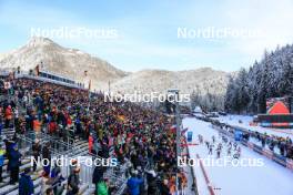 10.01.2024, Ruhpolding, Germany (GER): Event Feature: Race start with fans cheering on the grandstand - IBU World Cup Biathlon, relay women, Ruhpolding (GER). www.nordicfocus.com. © Manzoni/NordicFocus. Every downloaded picture is fee-liable.