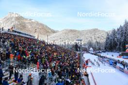 10.01.2024, Ruhpolding, Germany (GER): Event Feature: Race start with fans cheering on the grandstand - IBU World Cup Biathlon, relay women, Ruhpolding (GER). www.nordicfocus.com. © Manzoni/NordicFocus. Every downloaded picture is fee-liable.