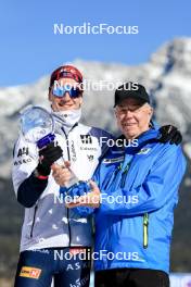 17.03.2024, Canmore, Canada (CAN): Johannes Thingnes Boe (NOR), Olle Dahlin (SWE), IBU President, (l-r) - IBU World Cup Biathlon, cups, Canmore (CAN). www.nordicfocus.com. © Manzoni/NordicFocus. Every downloaded picture is fee-liable.