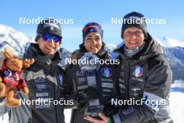 14.03.2024, Canmore, Canada (CAN): Lisa Vittozzi (ITA), Jonne Kahkonen (FIN), coach Team Italy, (l-r) - IBU World Cup Biathlon, trophies, Canmore (CAN). www.nordicfocus.com. © Manzoni/NordicFocus. Every downloaded picture is fee-liable.